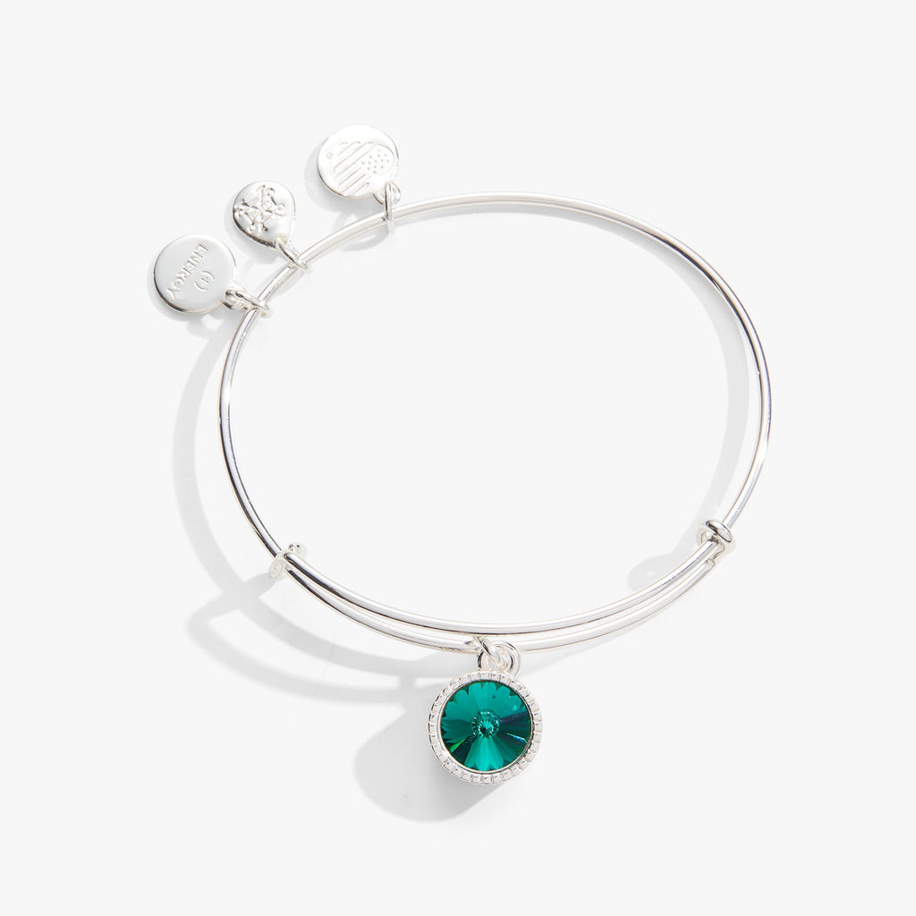 May birthstone charm bangle featuring an emerald green crystal