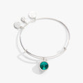 May birthstone charm bangle featuring an emerald green crystal