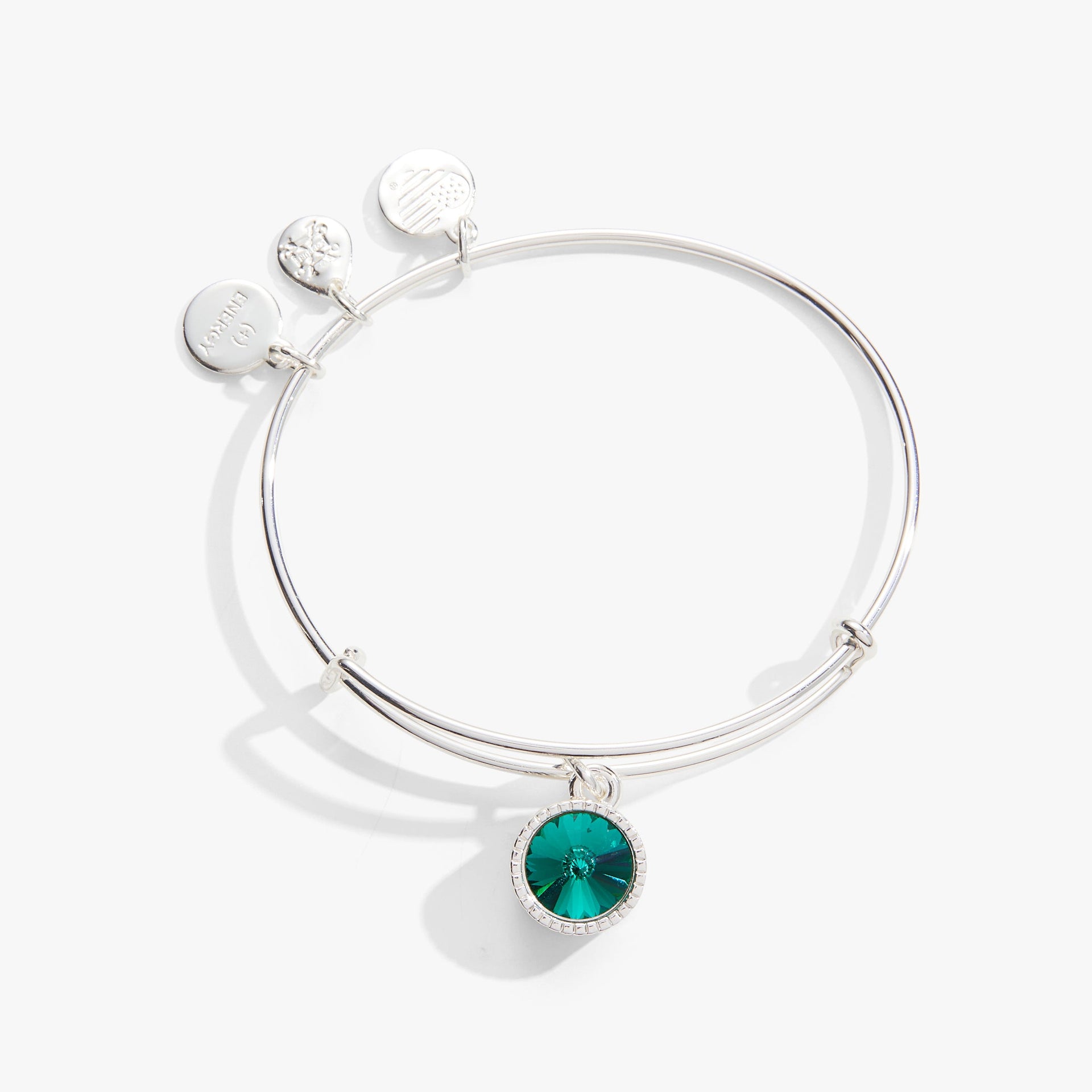 May birthstone charm bangle featuring an emerald green crystal