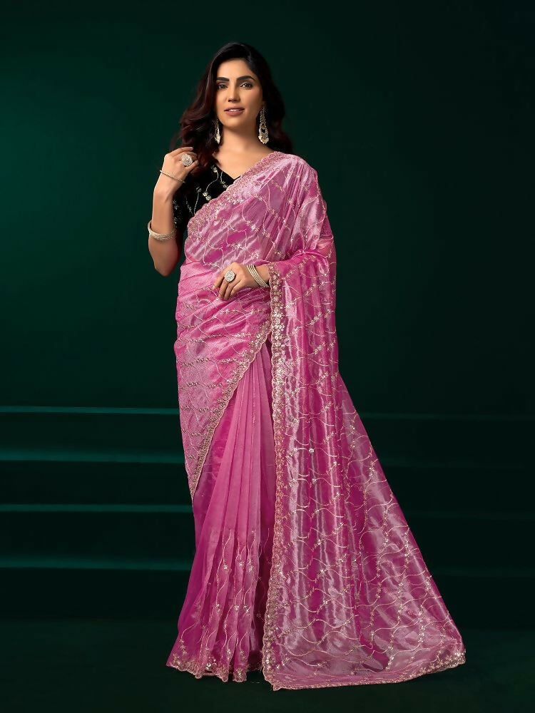 Pink net party wear saree featuring a black velvet blouse