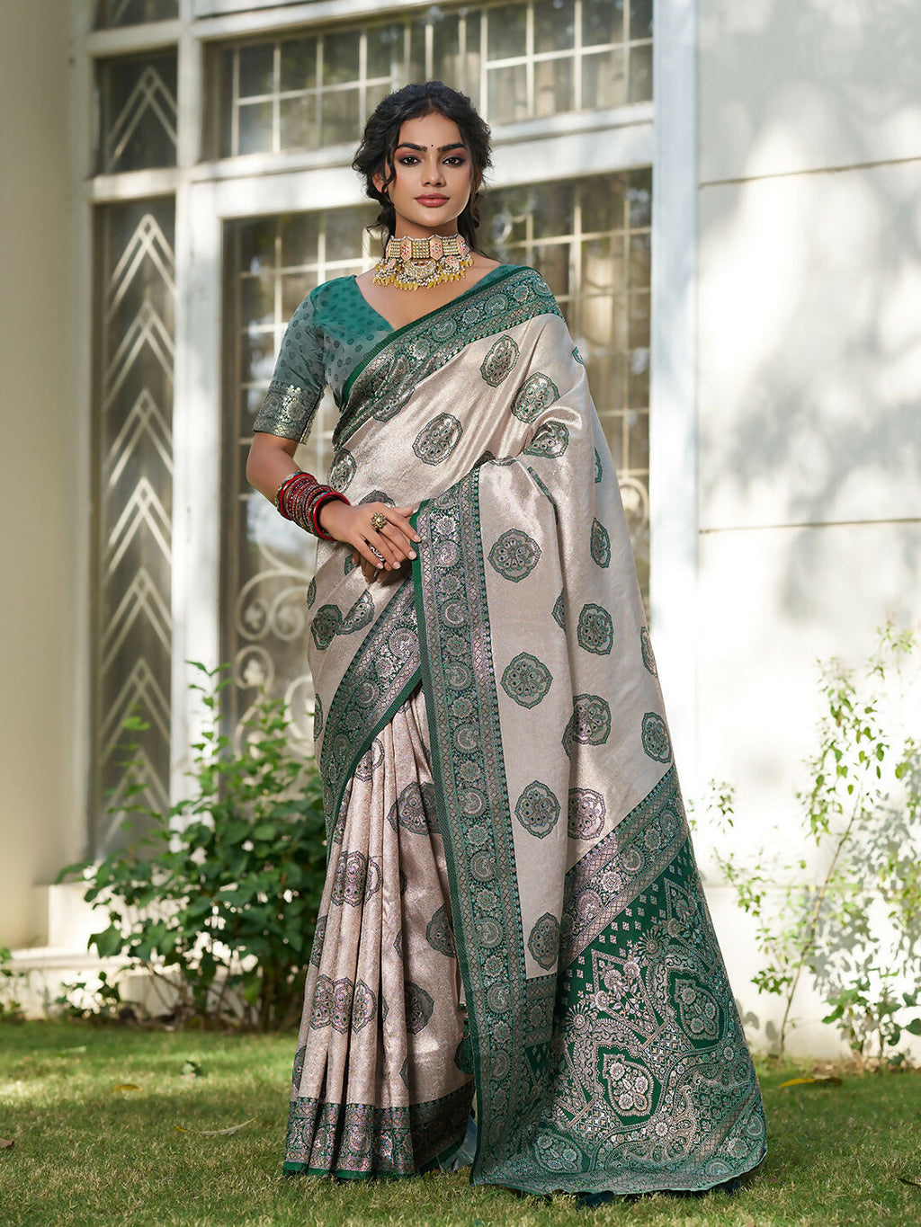 Cream and dark green silk blend saree, elegant traditional attire.