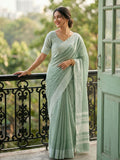 Beautiful Rama colored linen saree with matching blouse fabric.