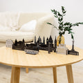 A wooden Budapest skyline sculpture displayed as elegant travel-themed home decor on a shelf.