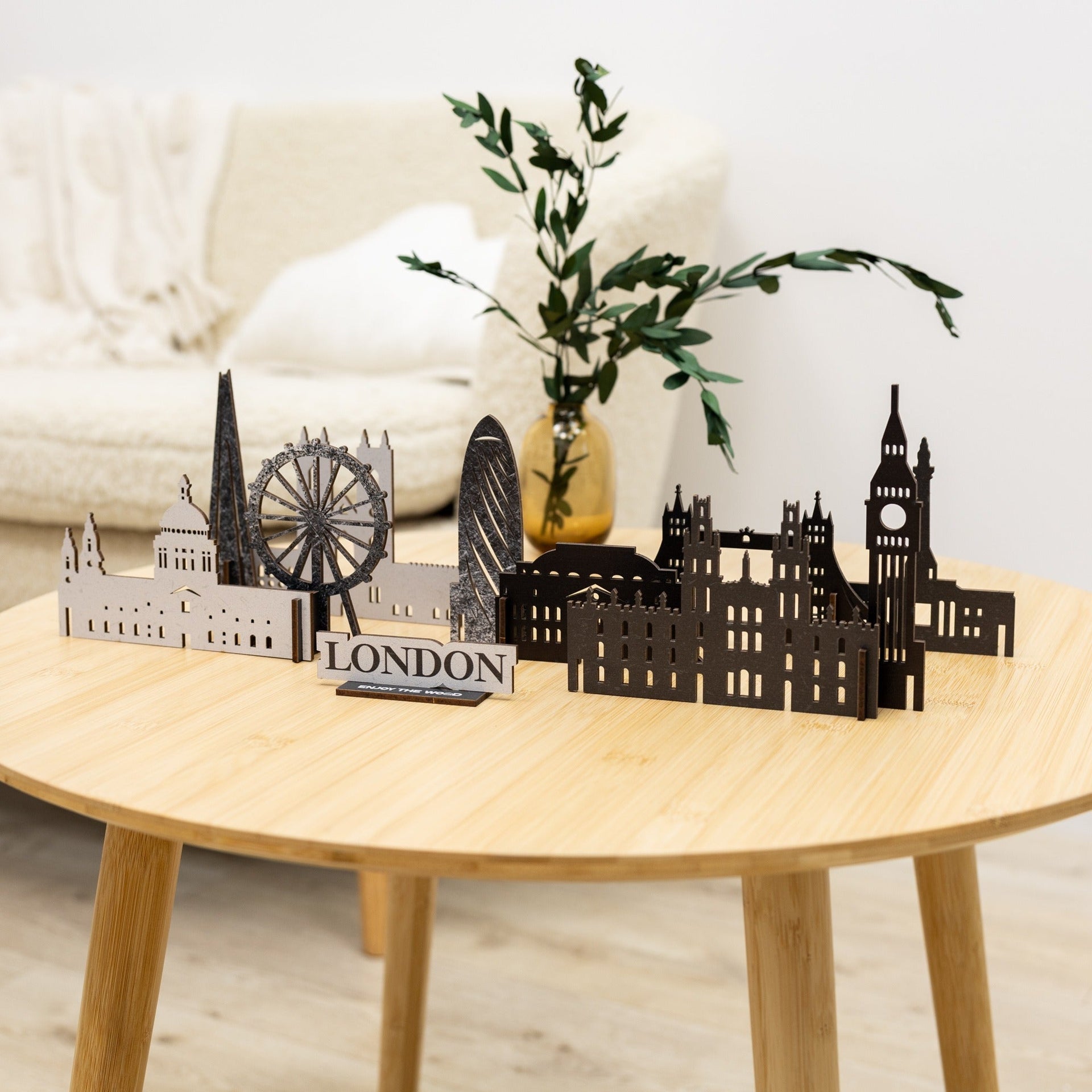 Handcrafted wooden London city map wall decor displayed in a modern interior.