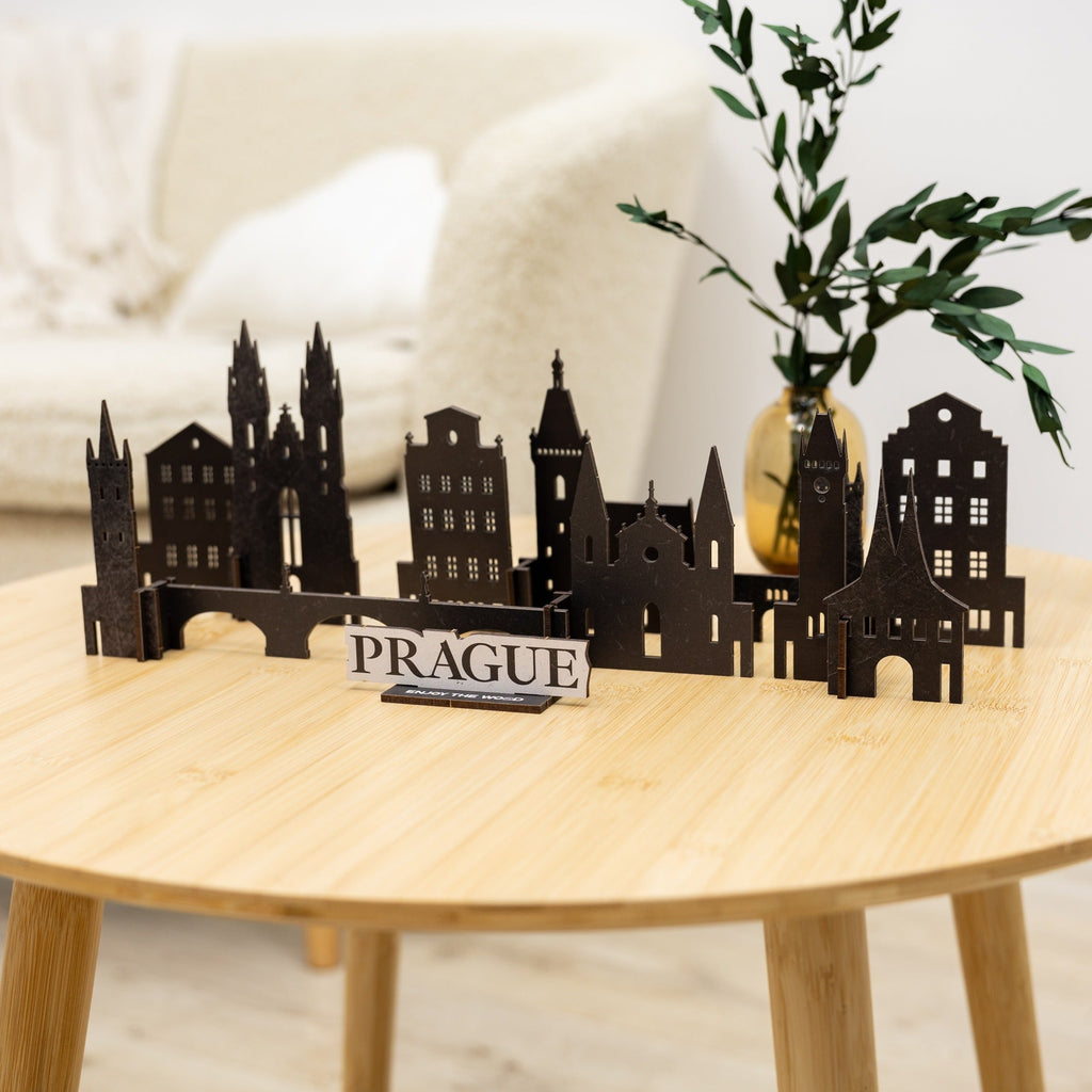 Assembled wooden model of the Prague skyline on a wooden base