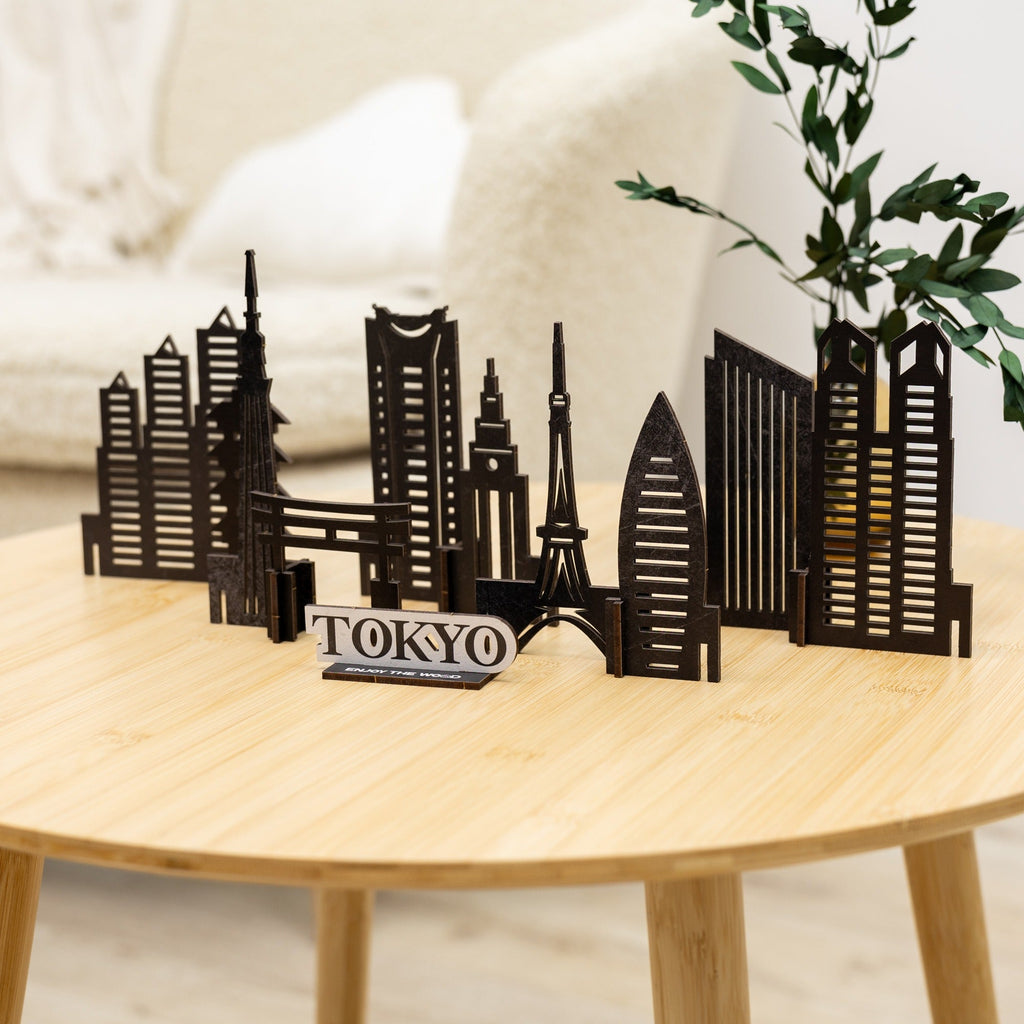 Close-up of a laser-cut wooden Tokyo city skyline decor piece on a wall
