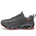Unisex black knit running sneakers with orange sole accents and pull-on design