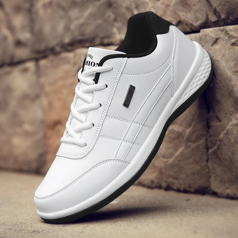 Men's leather lace-up streetwear sneakers in solid color design with rubber outsole