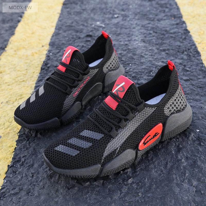 Men's lightweight breathable mesh slip-on running sneakers in a versatile athletic design.