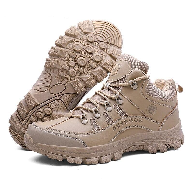 Stevvex men's waterproof hiking boots with rubber toe protection, shown in a tactical outdoor setting.