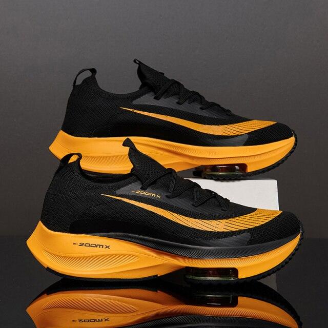 Men's orange air-cushioned athletic sneakers for running and basketball with rubber outsole