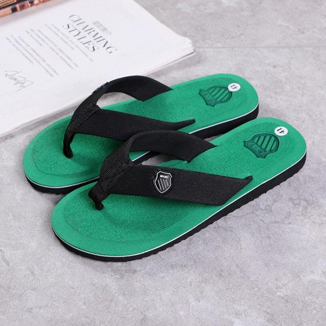 Unisex flip-flops with arch support footbed and anti-slip sole in a casual beach sandal style.