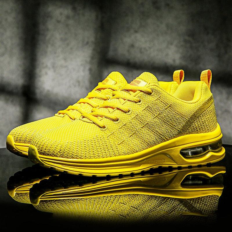 Men's black and yellow breathable knit running sneakers with air cushion sole