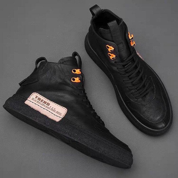 Men's handmade leather streetwear sneakers in black with durable rubber outsole.
