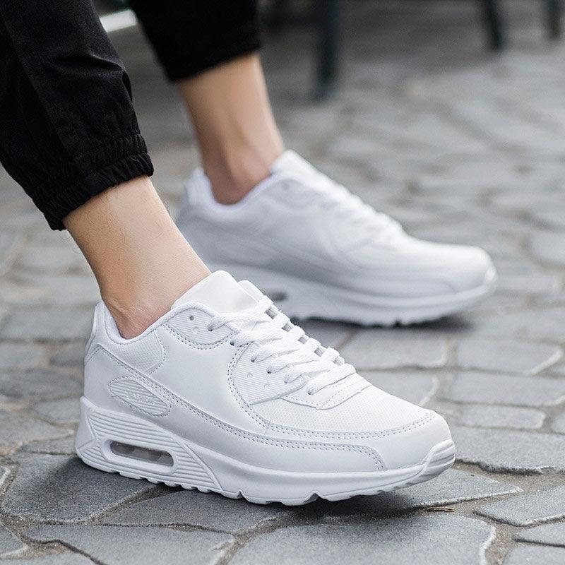 Unisex air cushion mesh running sneakers in solid colors, suitable for streetwear and athletic activity.