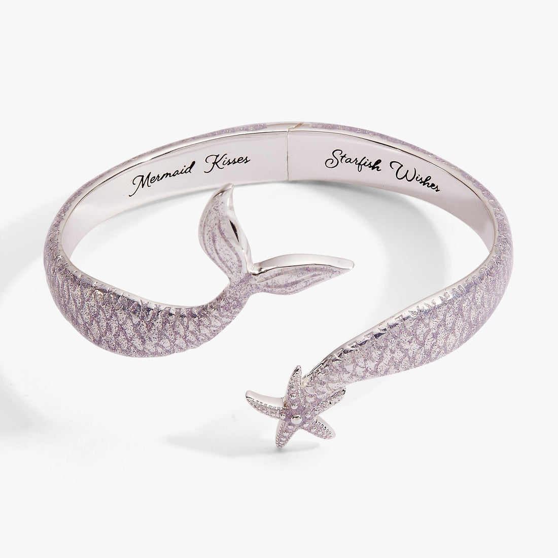 Silver-tone cuff bracelet with iridescent lavender enamel and a delicate starfish charm.