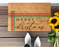Holiday Merry Christmas doormat in brown with red and green text
