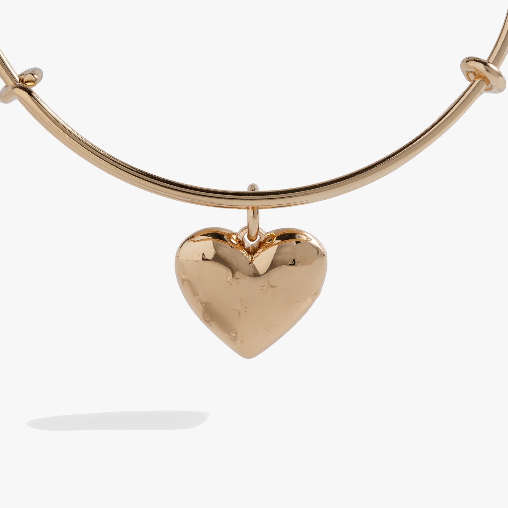 Gold Tone Heart Charm Expandable Bangle with Starburst Detail