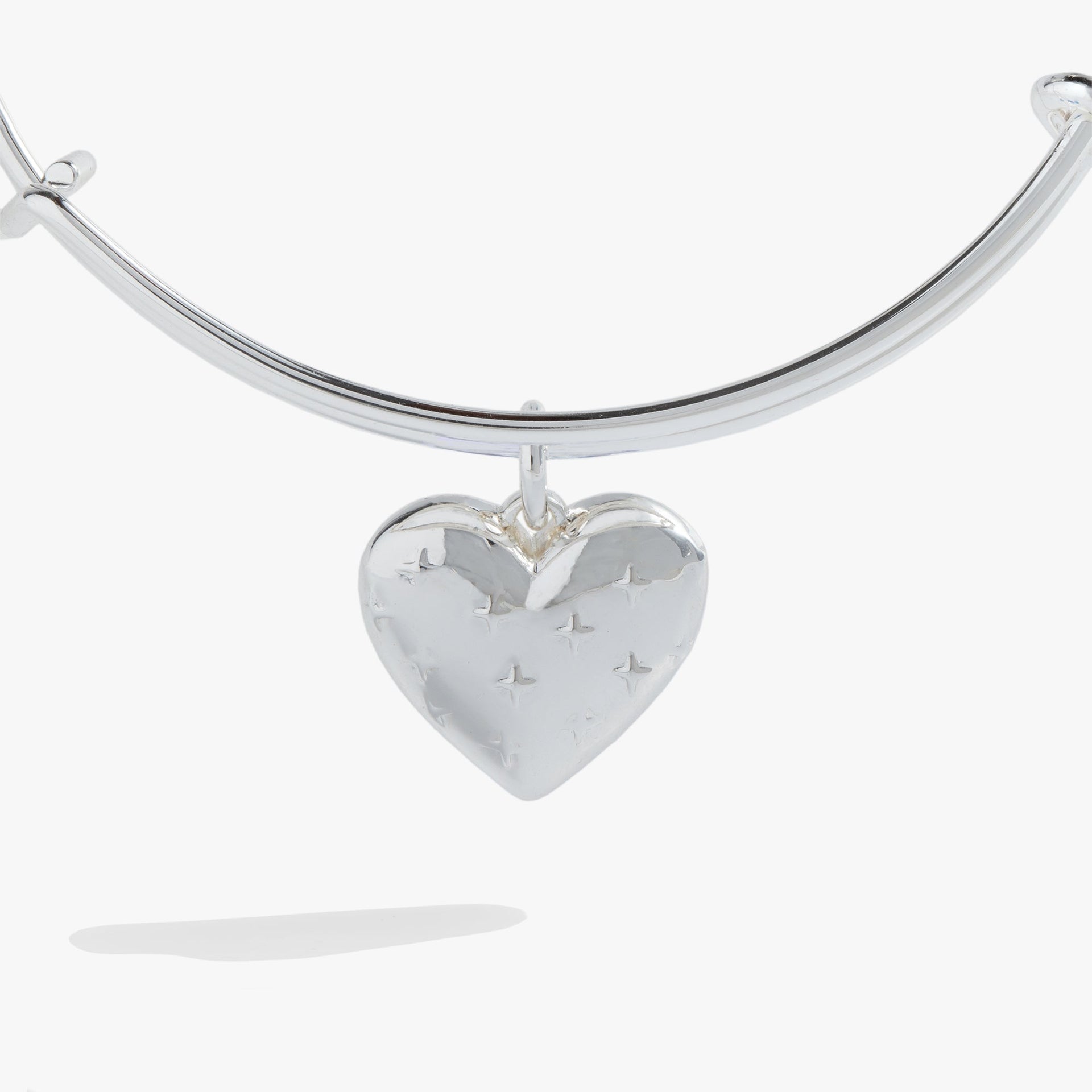 Silver Tone Expandable Heart Charm Bangle with Starburst Detail