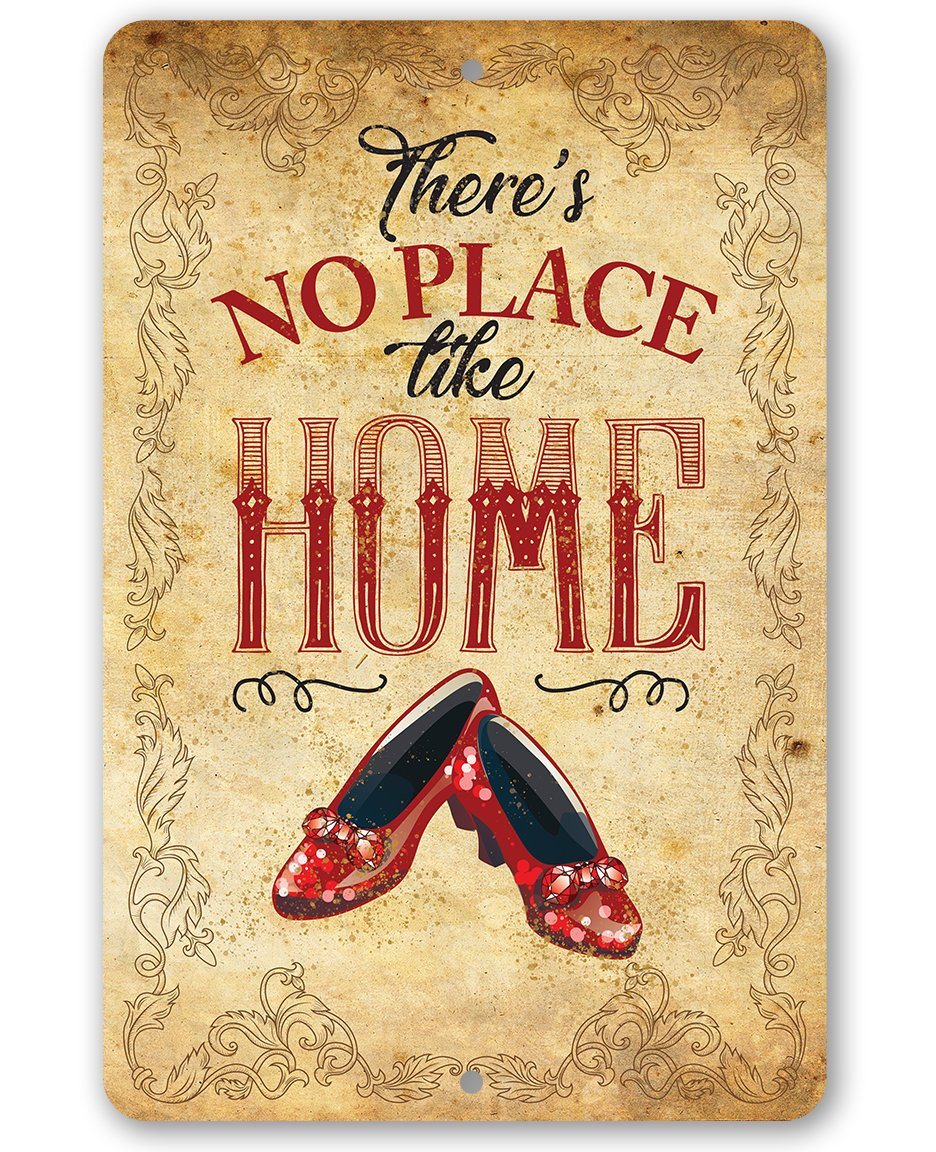 Wizard of Oz There is No Place Like Home metal sign featuring red ruby slippers and vintage scrollwork borders.