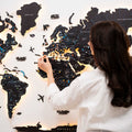 3D wooden world map with midnight finish and glowing interactive LED backlighting