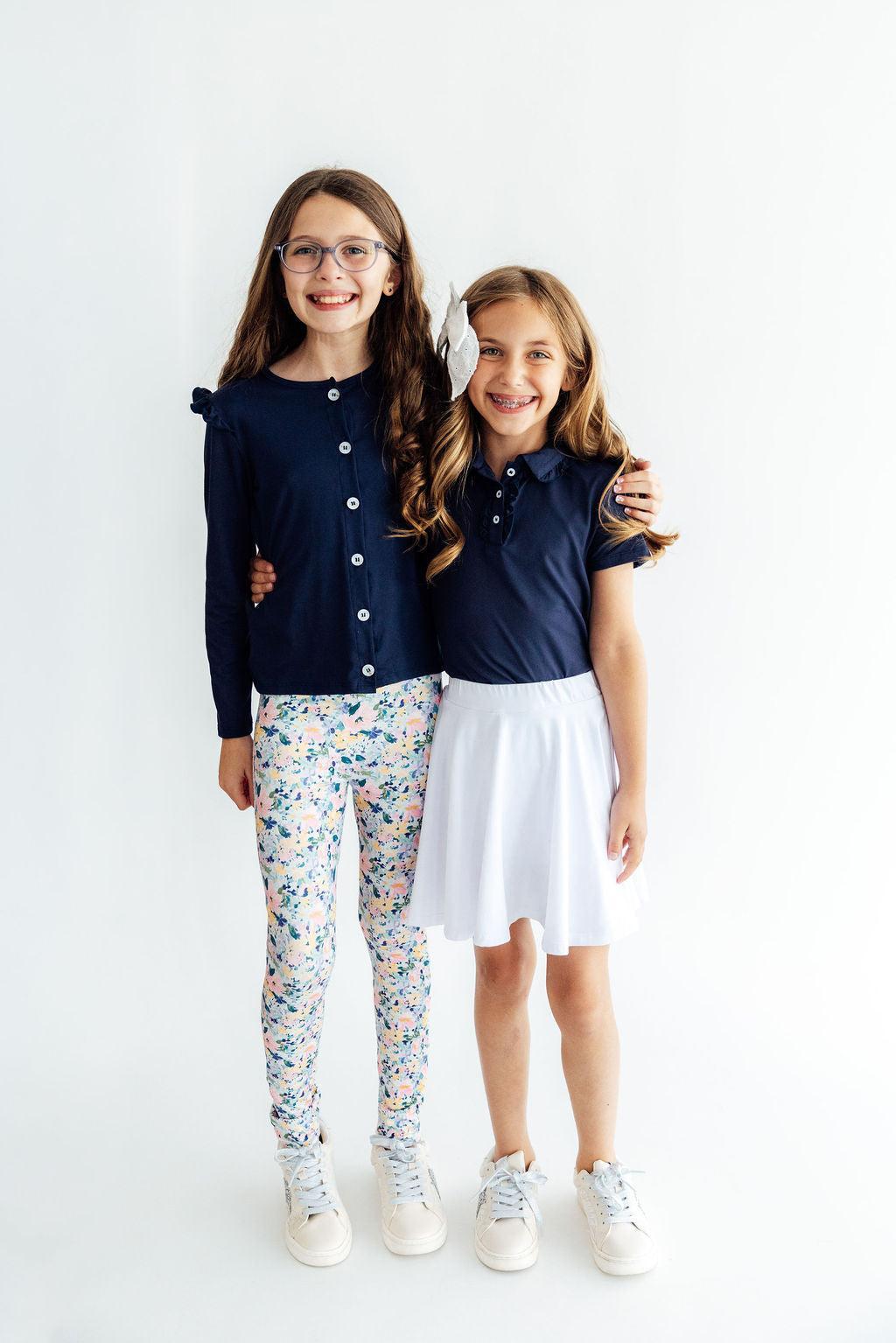 Navy S/S Ruffle Polo