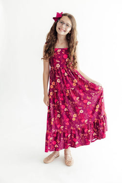 Girl wearing a Retro Wildflower Ruffle Maxi Dress with shoulder ruffles