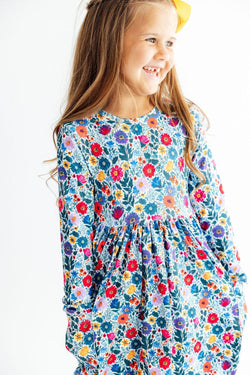 Vintage floral long sleeve twirl dress with scoop back neckline and pockets