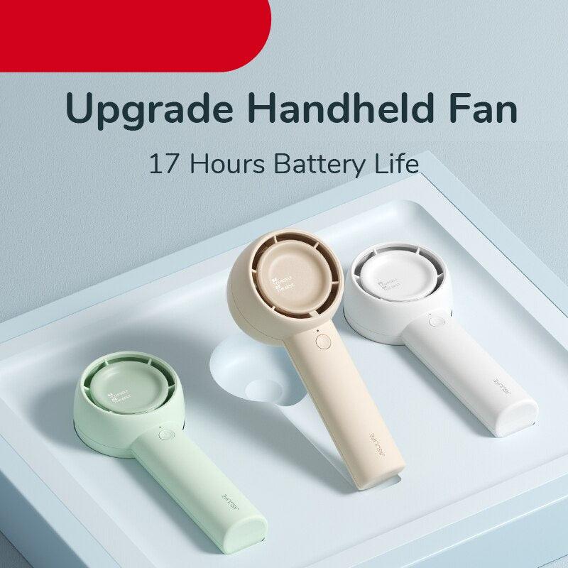 Modern handheld turbo fan with hidden blades in white, beige, and light-green.