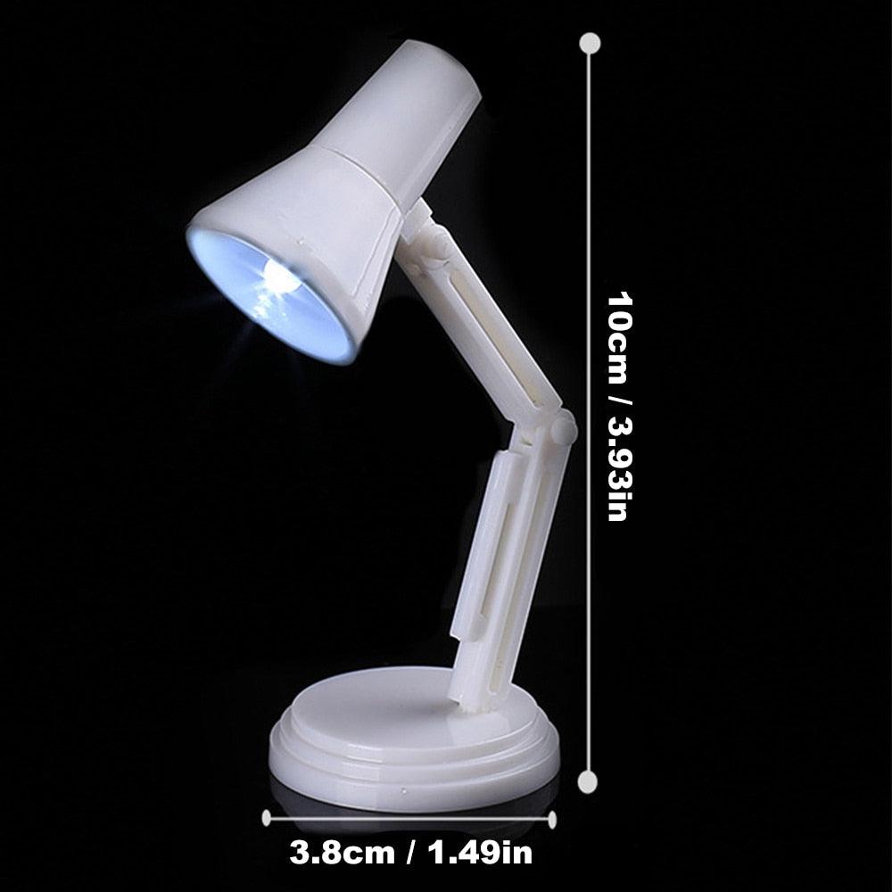 Miniature magnetic LED clip-on lamp available in multiple colors.