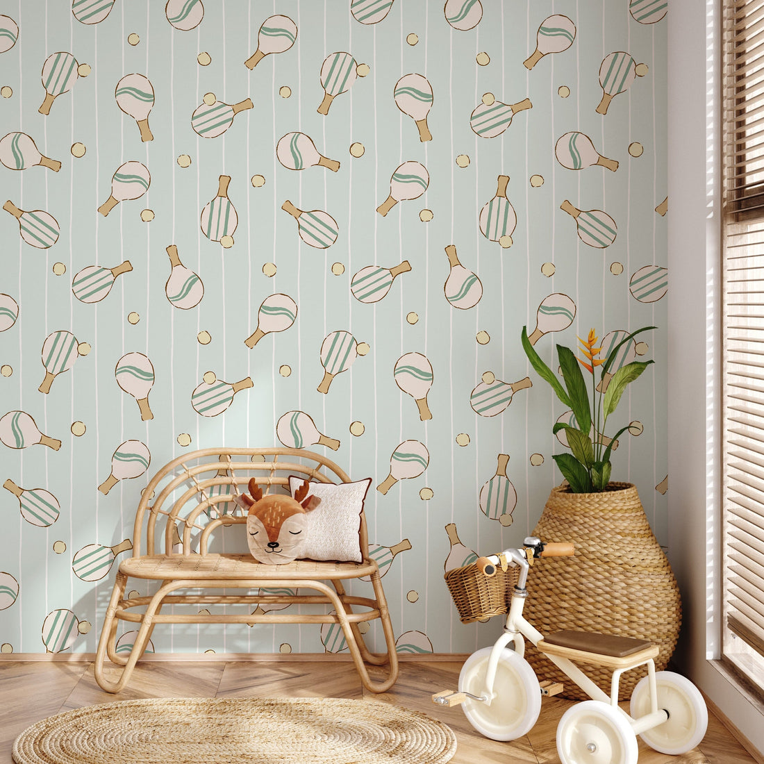 Close up of Ace geometric wallpaper featuring mint green, pale peach, and white lines in a modern nursery setting