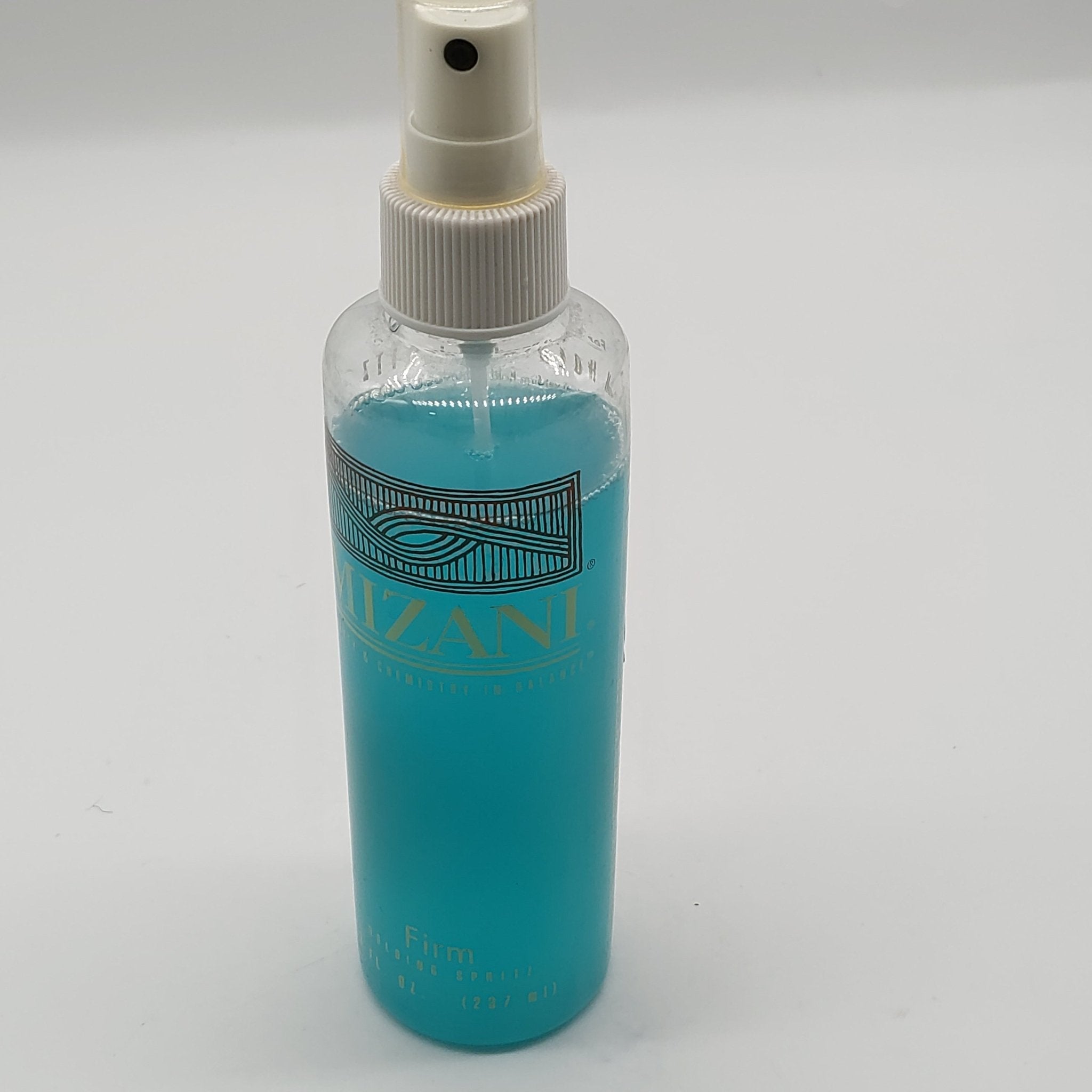 Mizani Firm Holding Spray in blue and white 8 fl oz bottle