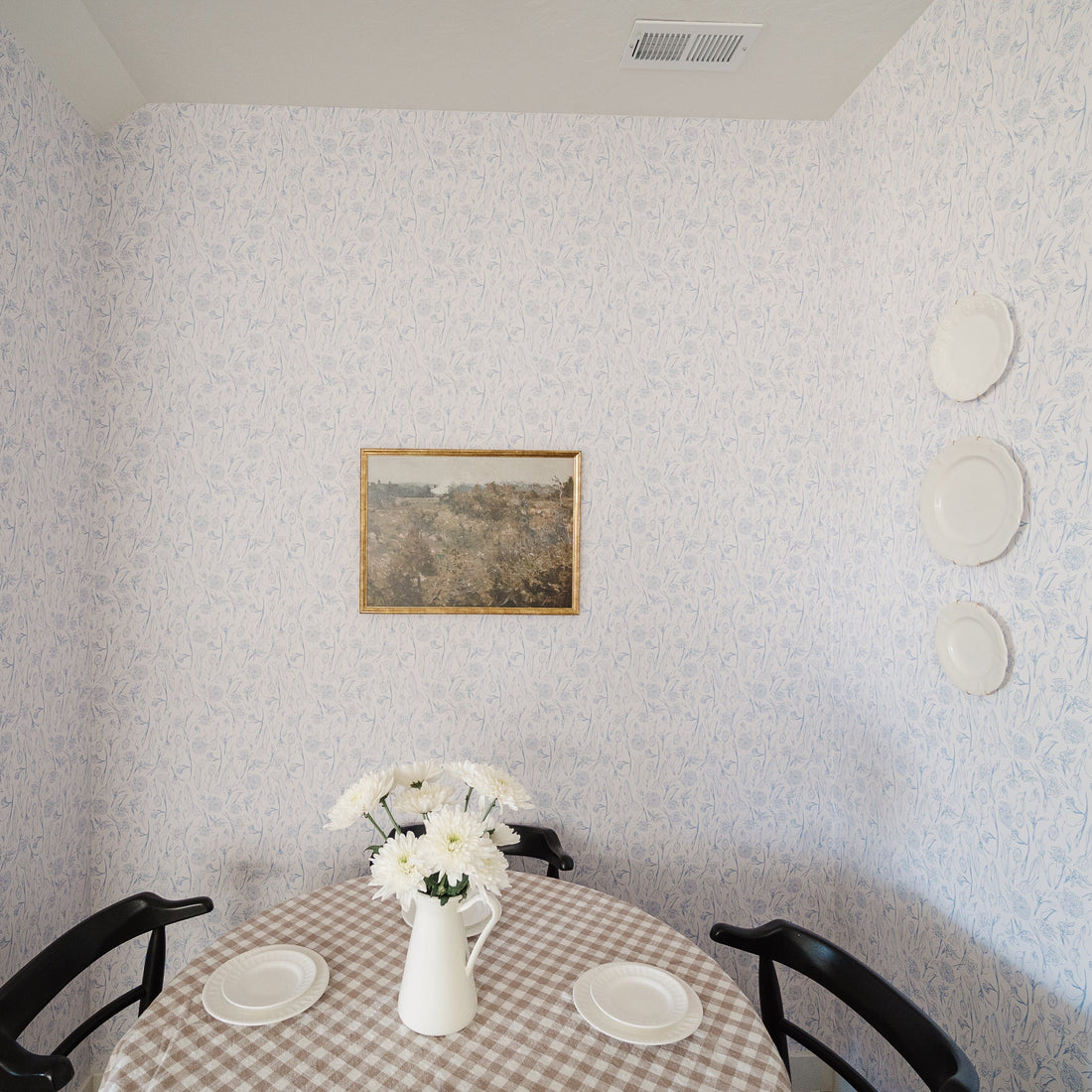 Eve floral wallpaper in a crisp white and blue traditional design.
