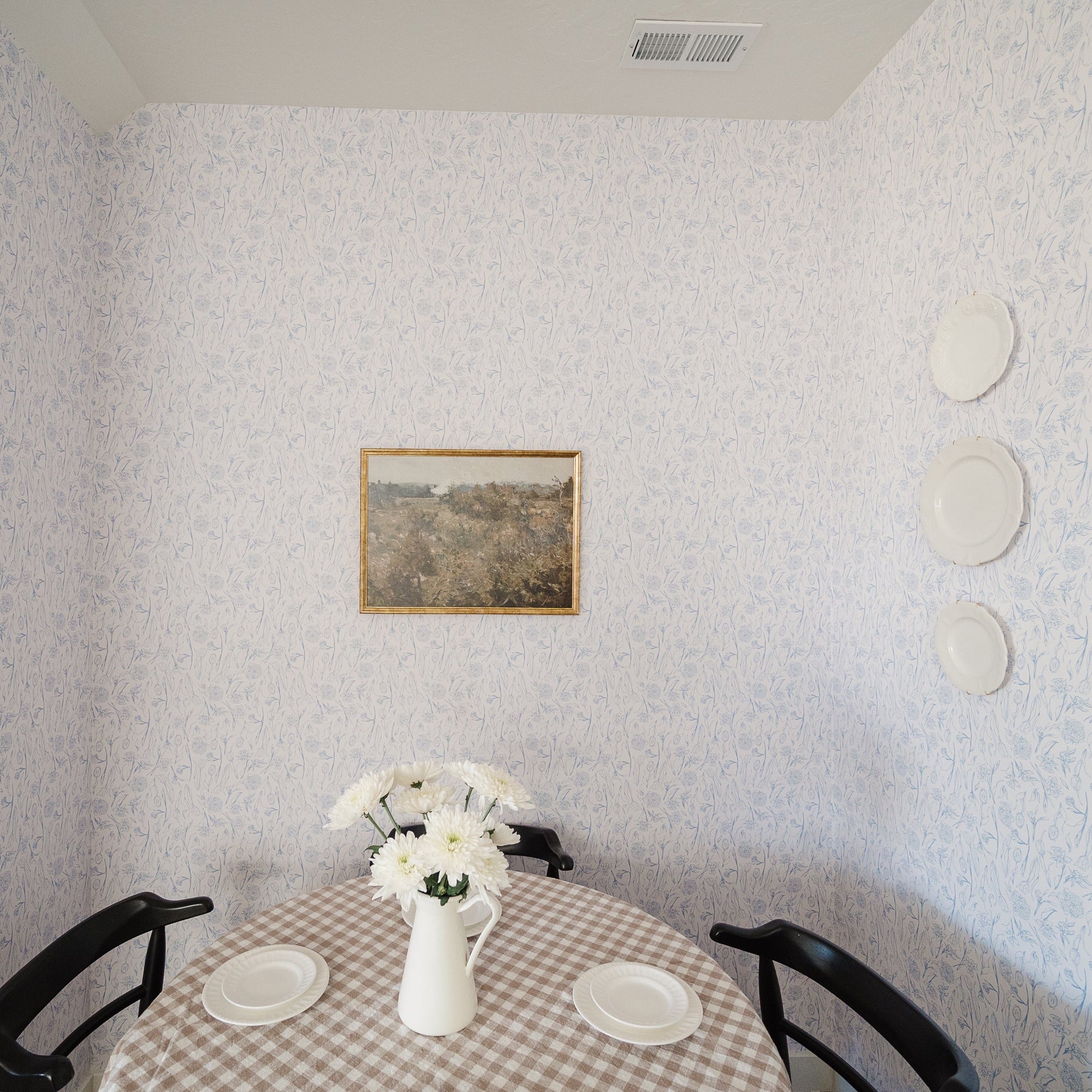Eve floral wallpaper in a crisp white and blue traditional design.