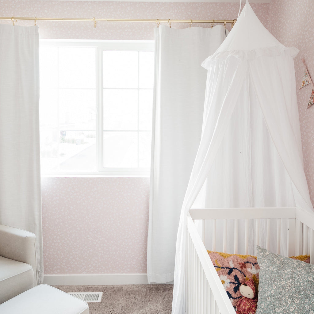 Elsie floral wallpaper featuring a design in pink, blue, and white