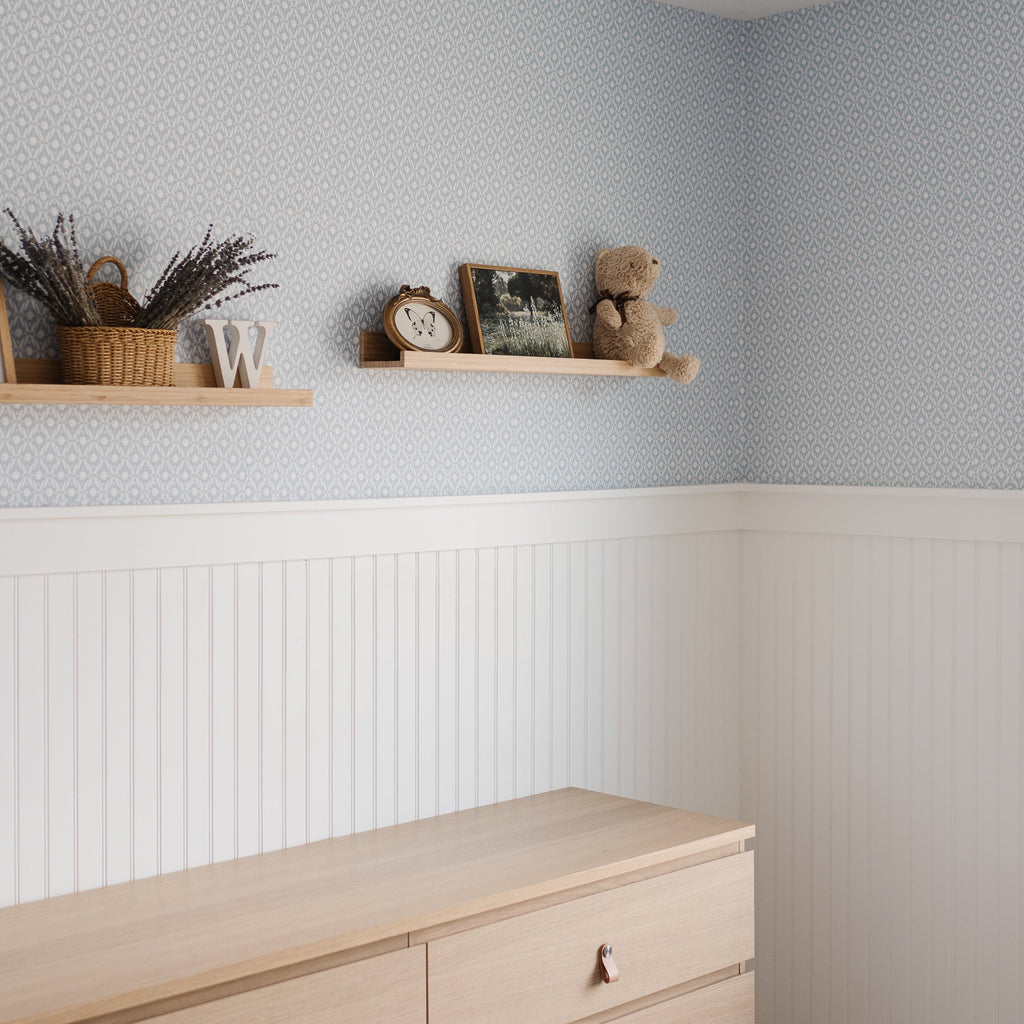 Elowen floral patterned wallpaper in blue, white, pink, and mint for nursery walls
