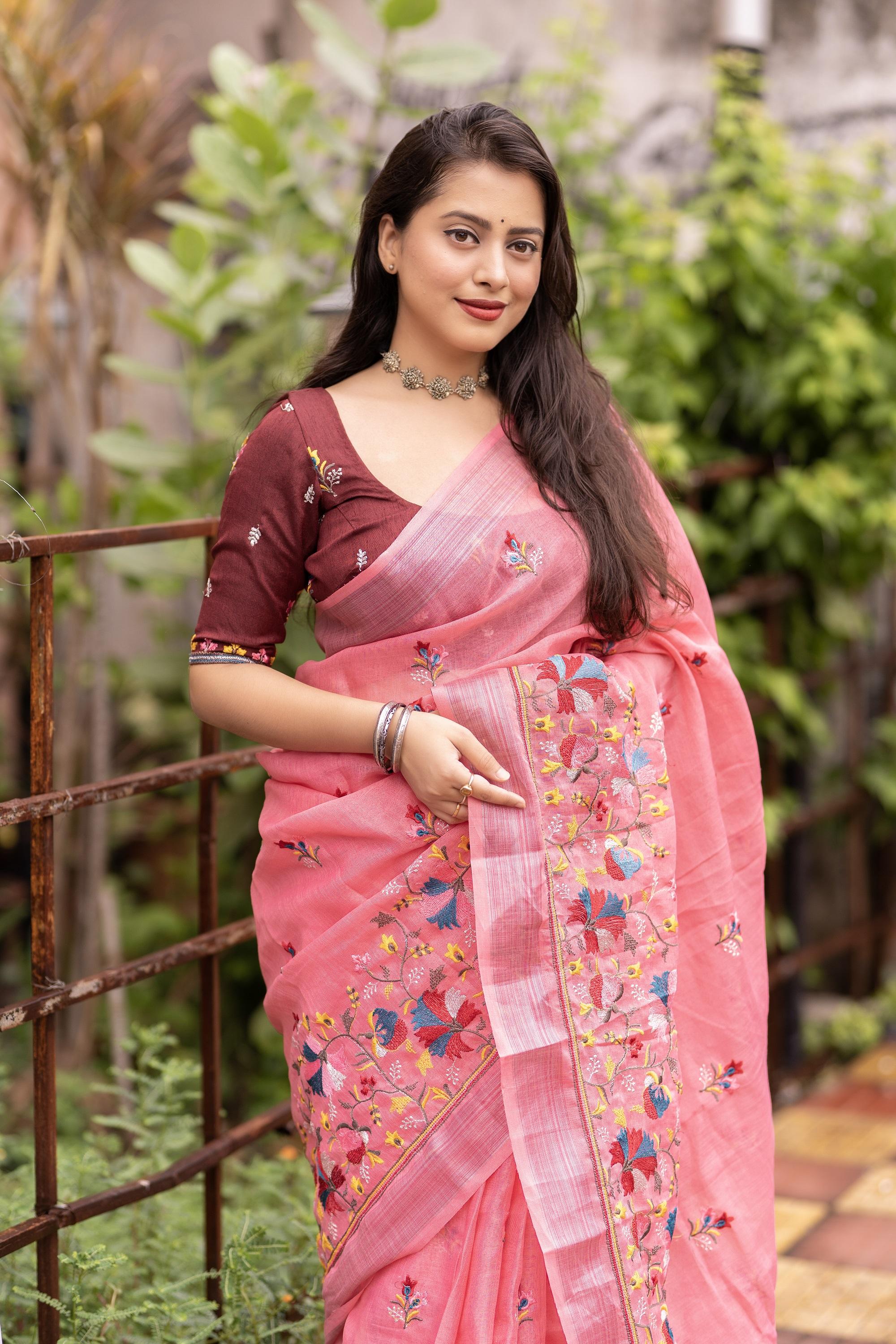 Pink Pure Linen Ethnic Motifs Saree with Embroidered Blouse