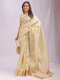 Elegant gold organza saree featuring a yellow blouse, perfect for festive events.