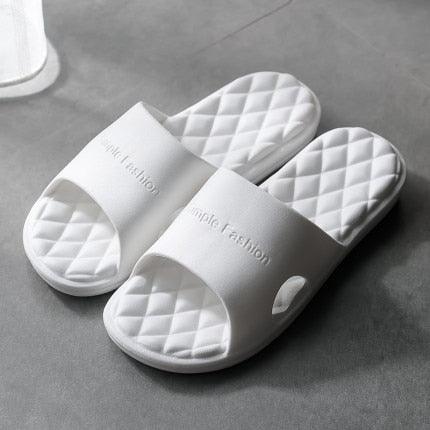 Women's thick-soled EVA shower slippers with wave-sole pattern in an open-toe design