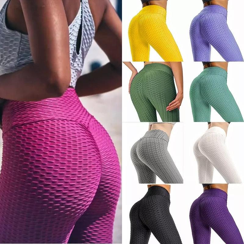 Model wearing high-waist seamless yoga leggings with tummy control and peach lift design
