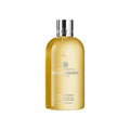 Molton Brown Flora Luminare Bath and Shower Gel bottle with floral scent profile