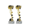 Set of gold and grey Monet's Garden sunset candleholders on a neutral background
