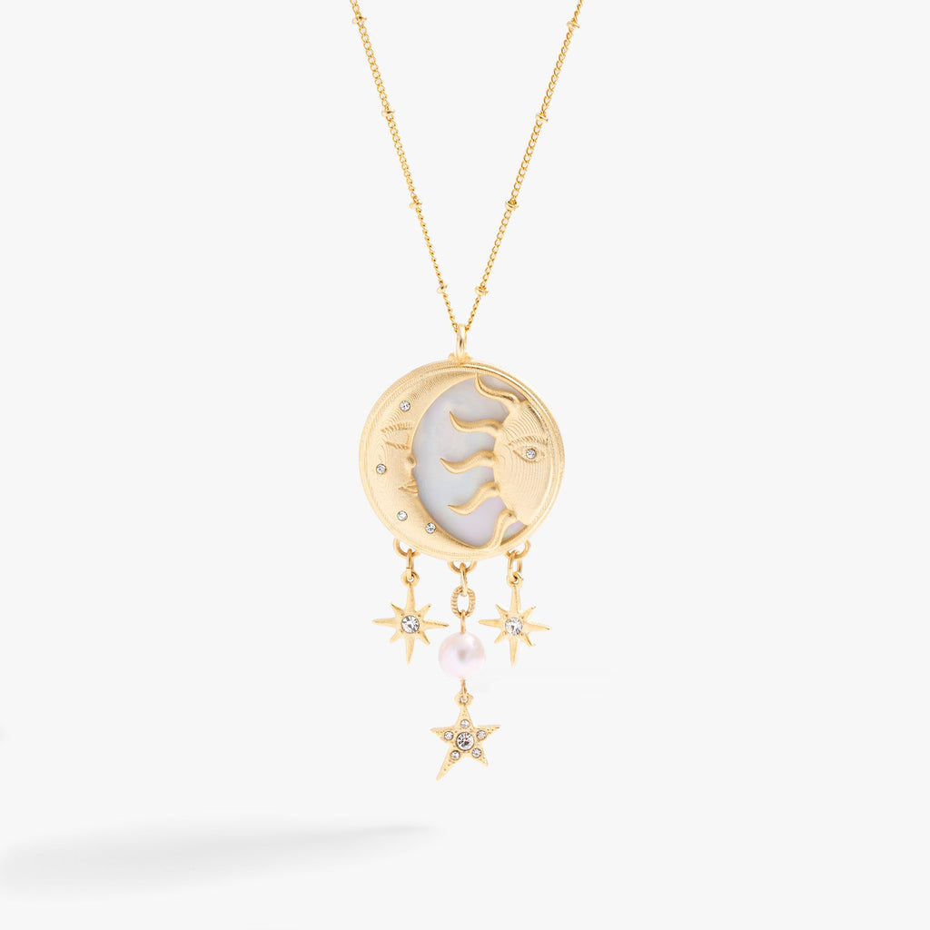 Gold-tone crescent moon and sun pendant necklace with Mother of Pearl and crystals