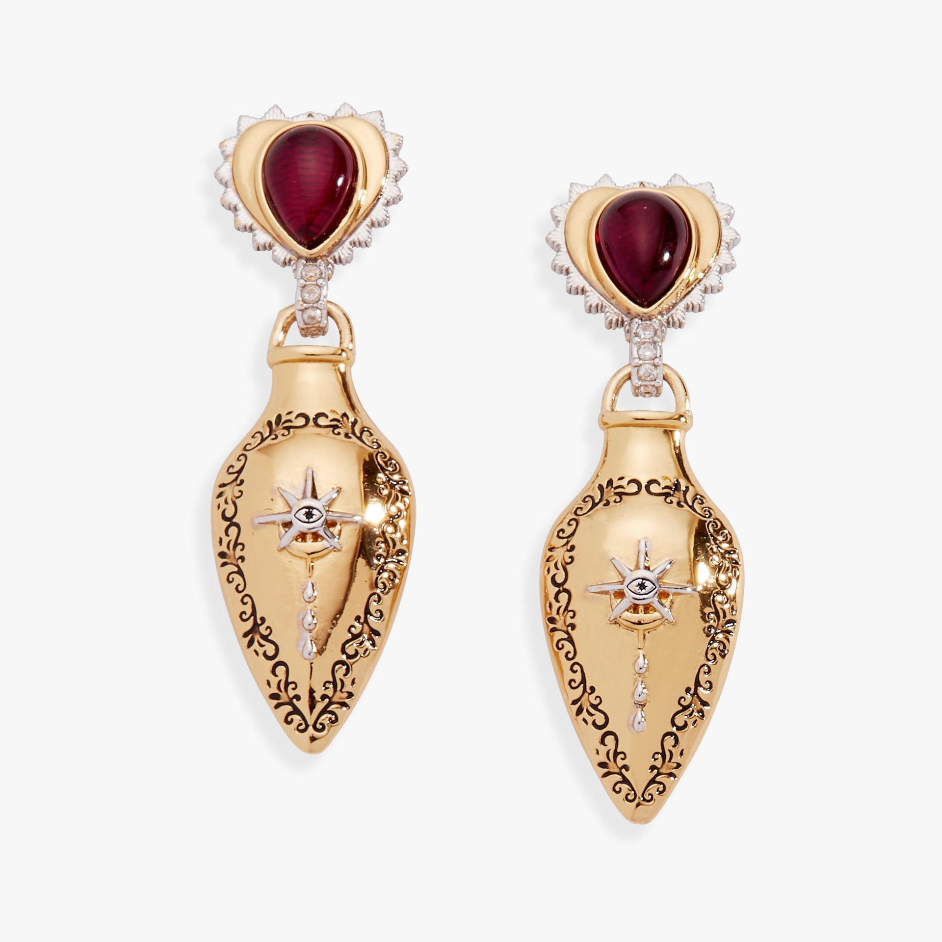 A pair of bohemian-style two-tone potion bottle drop earrings in gold and silver with deep-red gemstones and crystal accents.