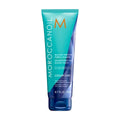 Bottle of Moroccanoil Blonde Perfecting Purple Shampoo 6.7 OZ on a neutral background