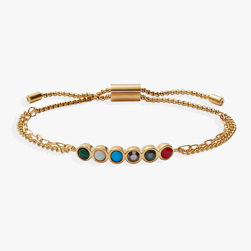 Multicolor gemstone acrostic mother bolo bracelet on a neutral background