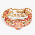 Five piece gold and pink bangle set for mom including rose quartz beads and floral charm bracelets