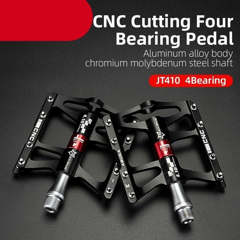 Pair of ultralight aluminum alloy mountain bike flat pedals with 4 bearings and anti-skid pins.