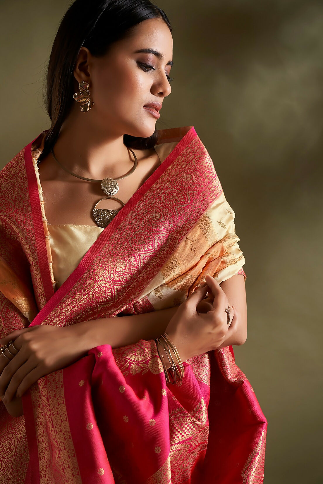 Cream and Orange Banarasi Silk Saree with Traditional Weaving Border