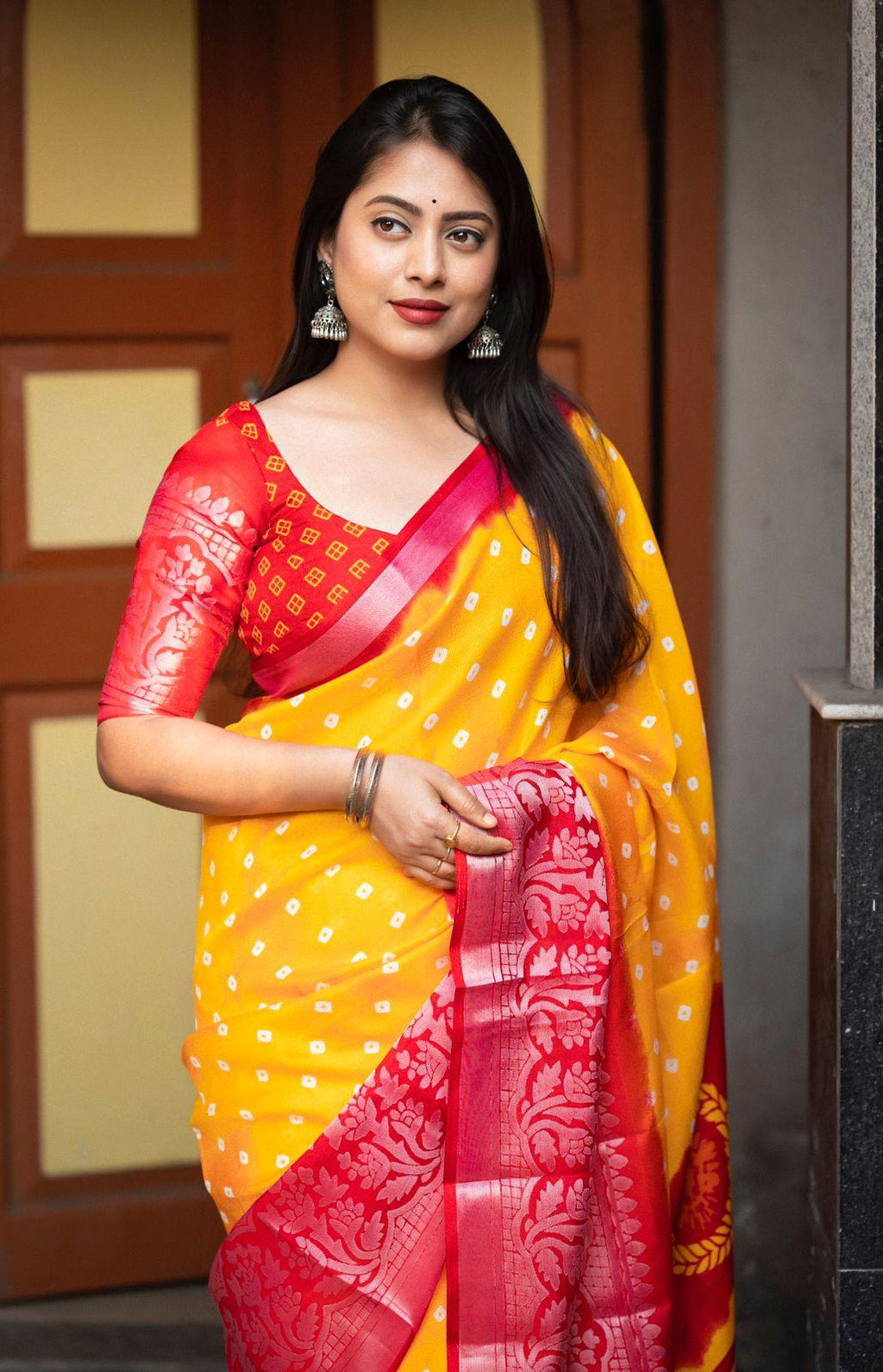 Yellow Jute Silk Printed Saree with Bandez and Cut Broaso Border